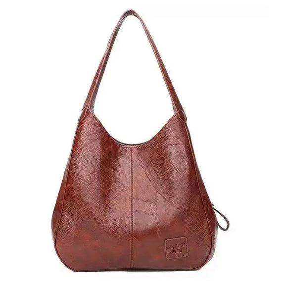 6. Vintage axelremsväska i konstgjort läder