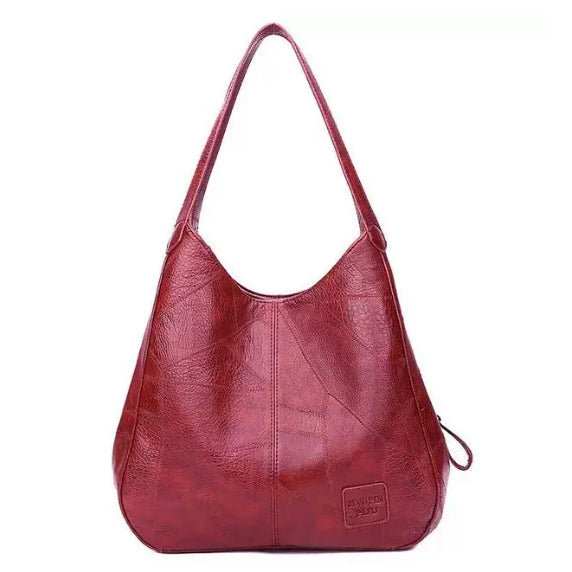 6. Vintage axelremsväska i konstgjort läder