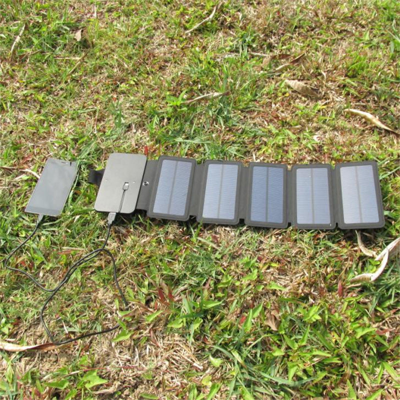 99. Smidig solpanel för USB laddning av mobiltelefon