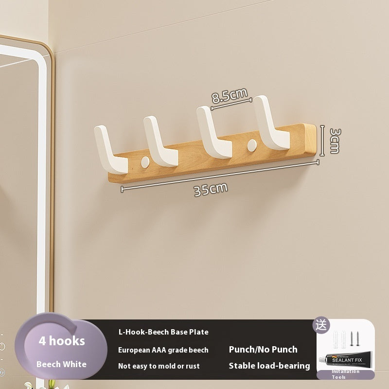 23. Väggmonterad hängare av trä