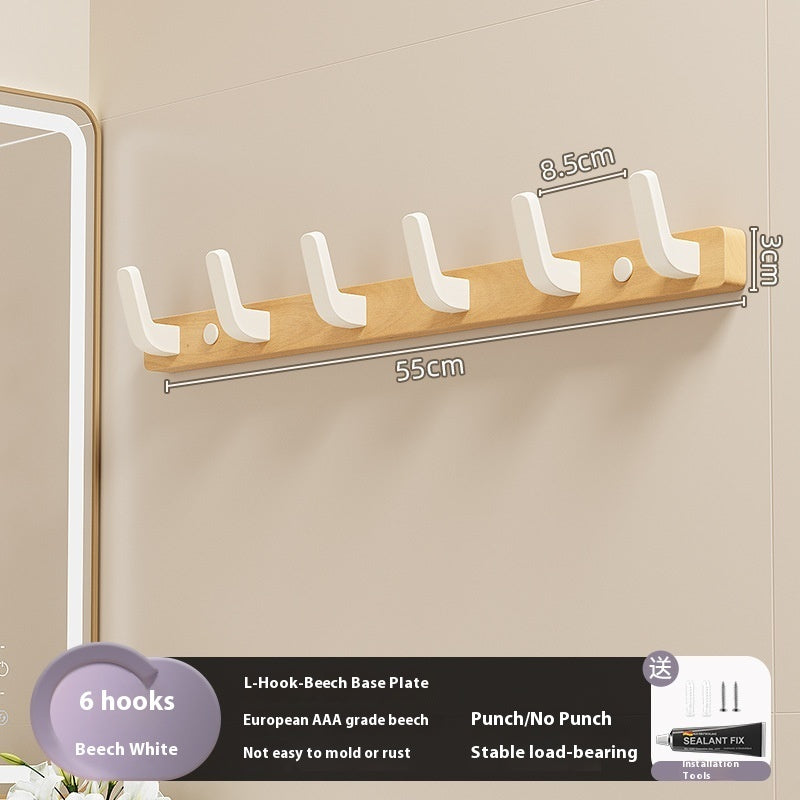 23. Väggmonterad hängare av trä