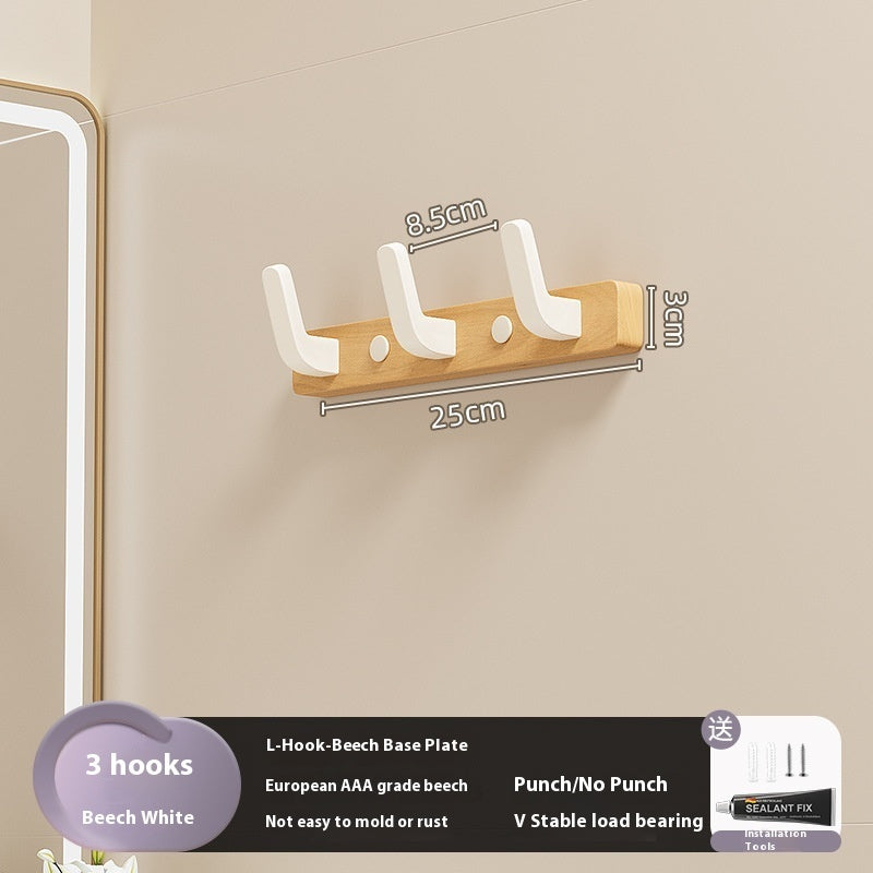 23. Väggmonterad hängare av trä