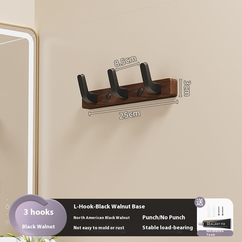 23. Väggmonterad hängare av trä