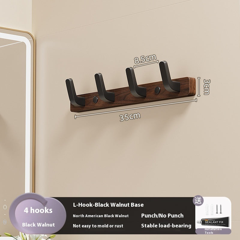 23. Väggmonterad hängare av trä