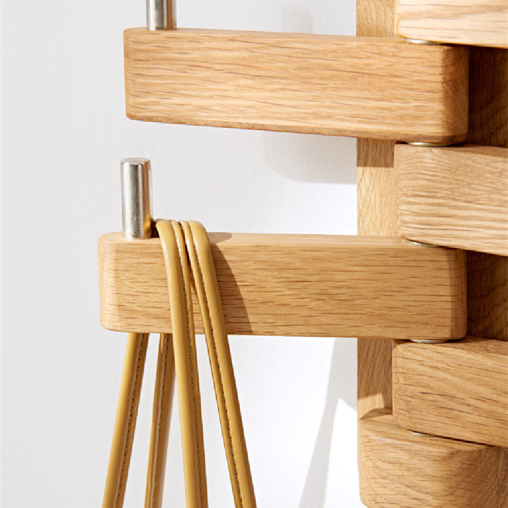 23. Vägghängare av trä