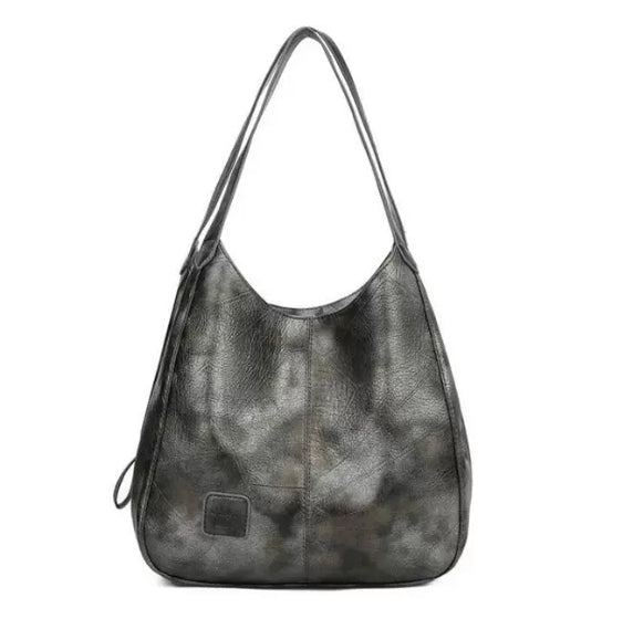 6. Vintage axelremsväska i konstgjort läder